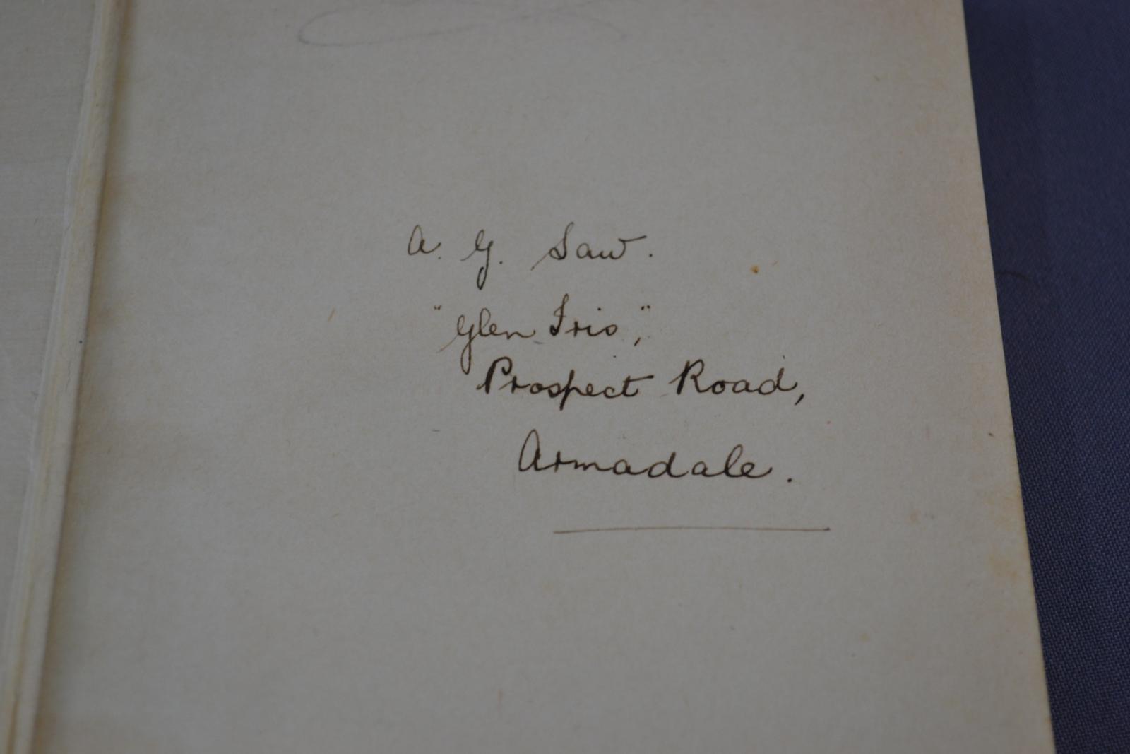hand written, in pen, inscription on blank inside white page of book. Text "A.G. Saw 'Glen Iris', Prospect Road, Armadale"'
