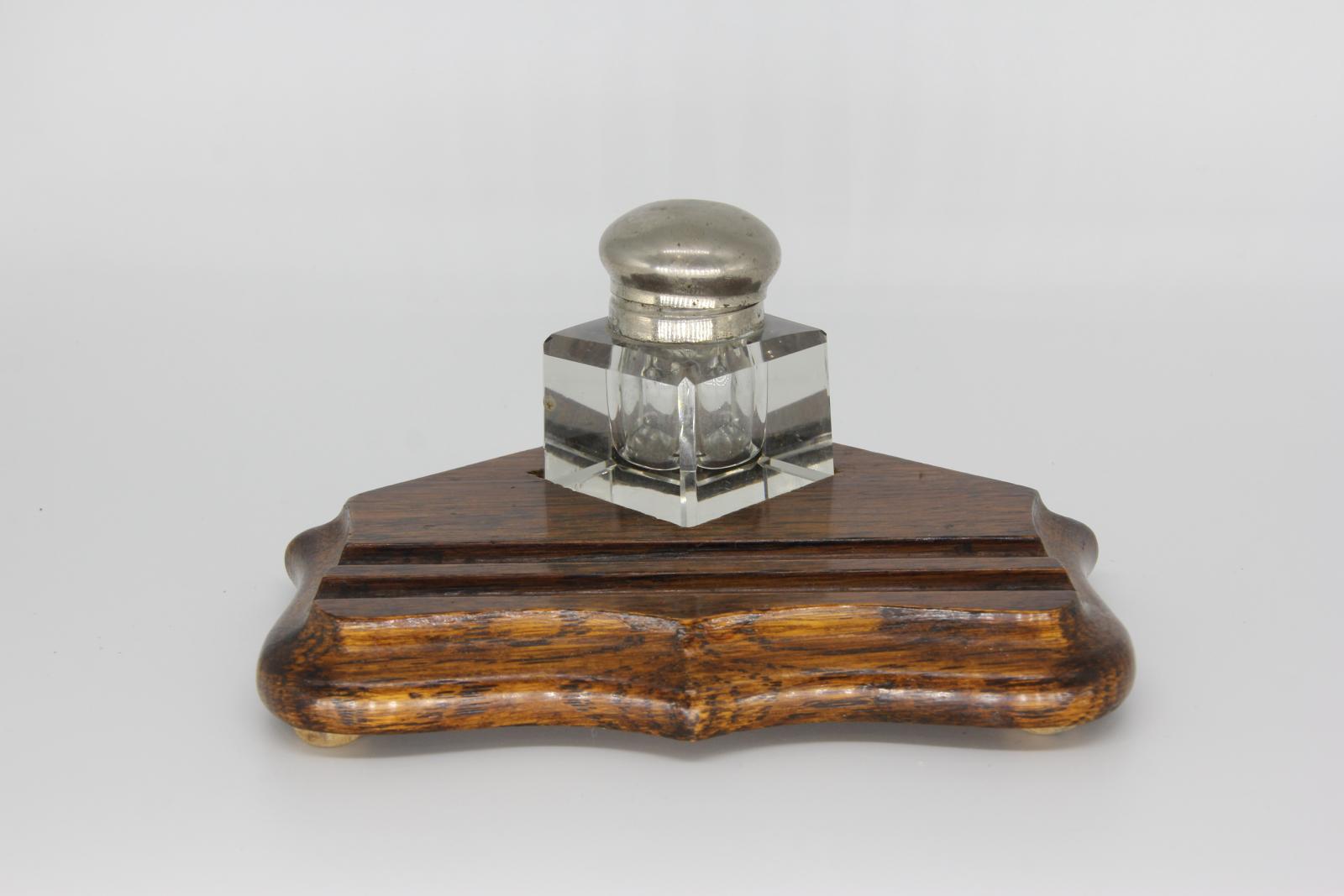 ink well on wooden stand