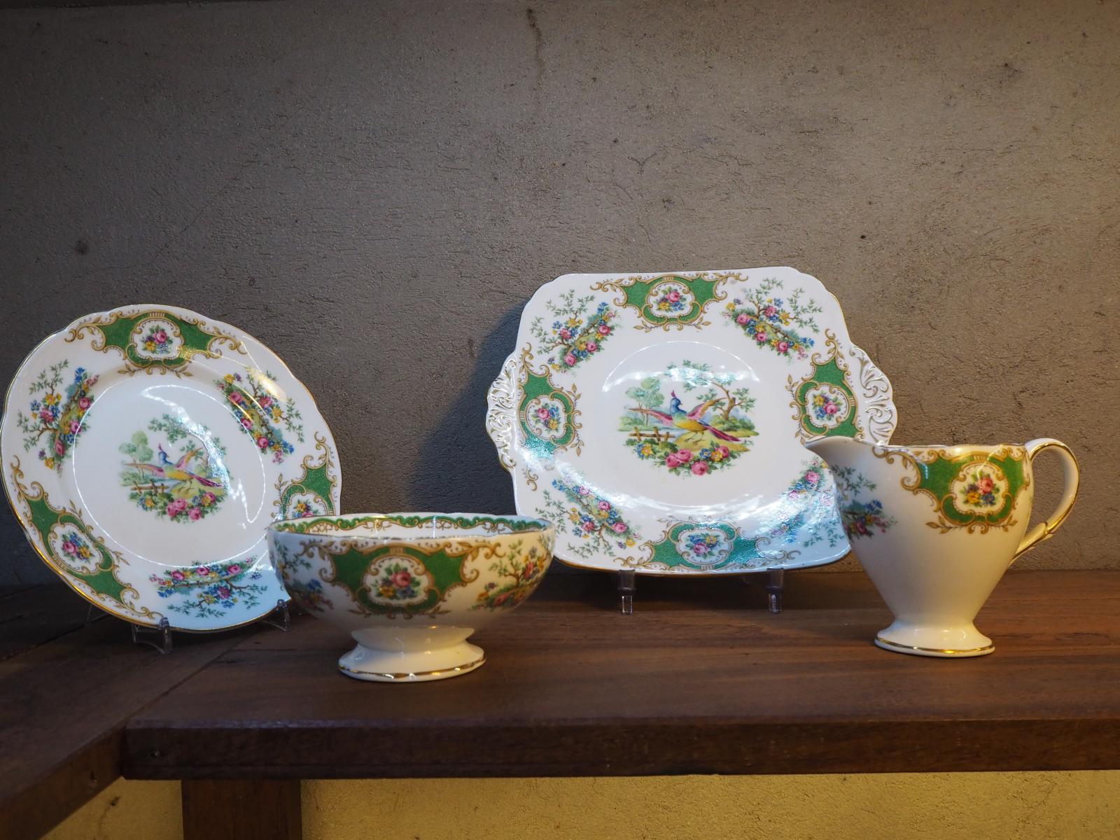 plates, sugar bowl and milk jug