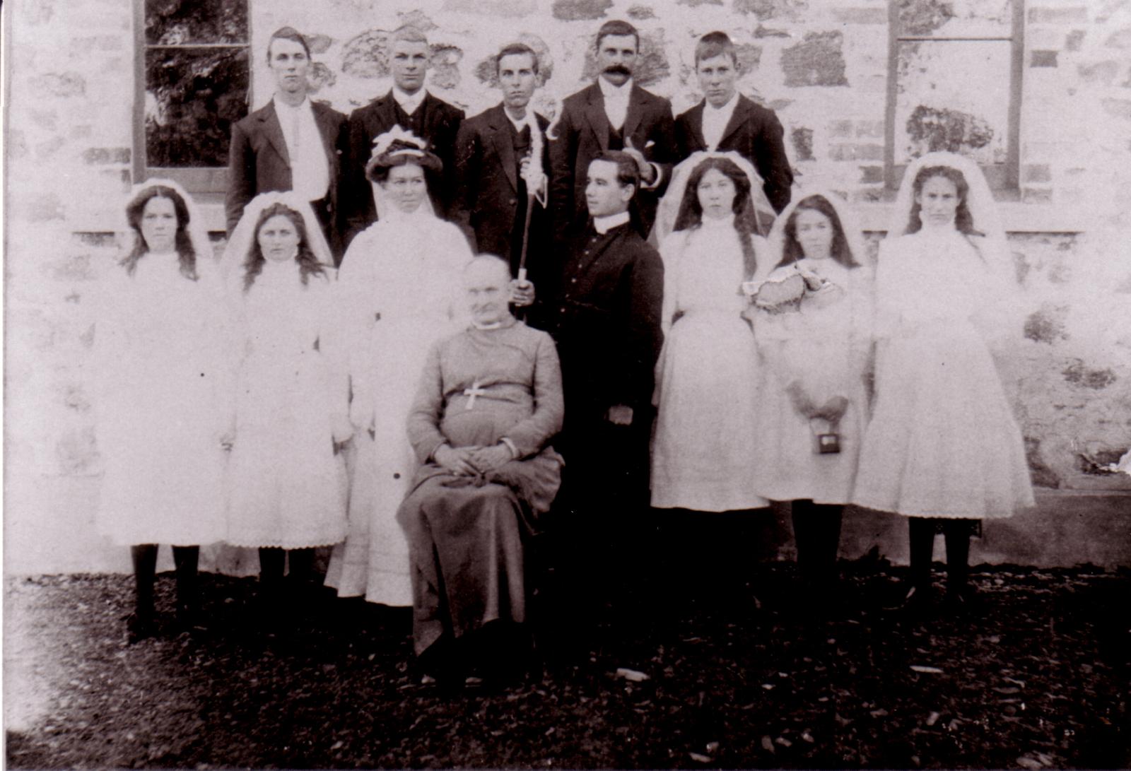 Confirmation Service. Anglican Church.  L-R: Bill Betts, George Peacock, Harold Peacock, Ralph Peacock, Troll Tufnell.  Front : Second From Left: Emily Gillam.