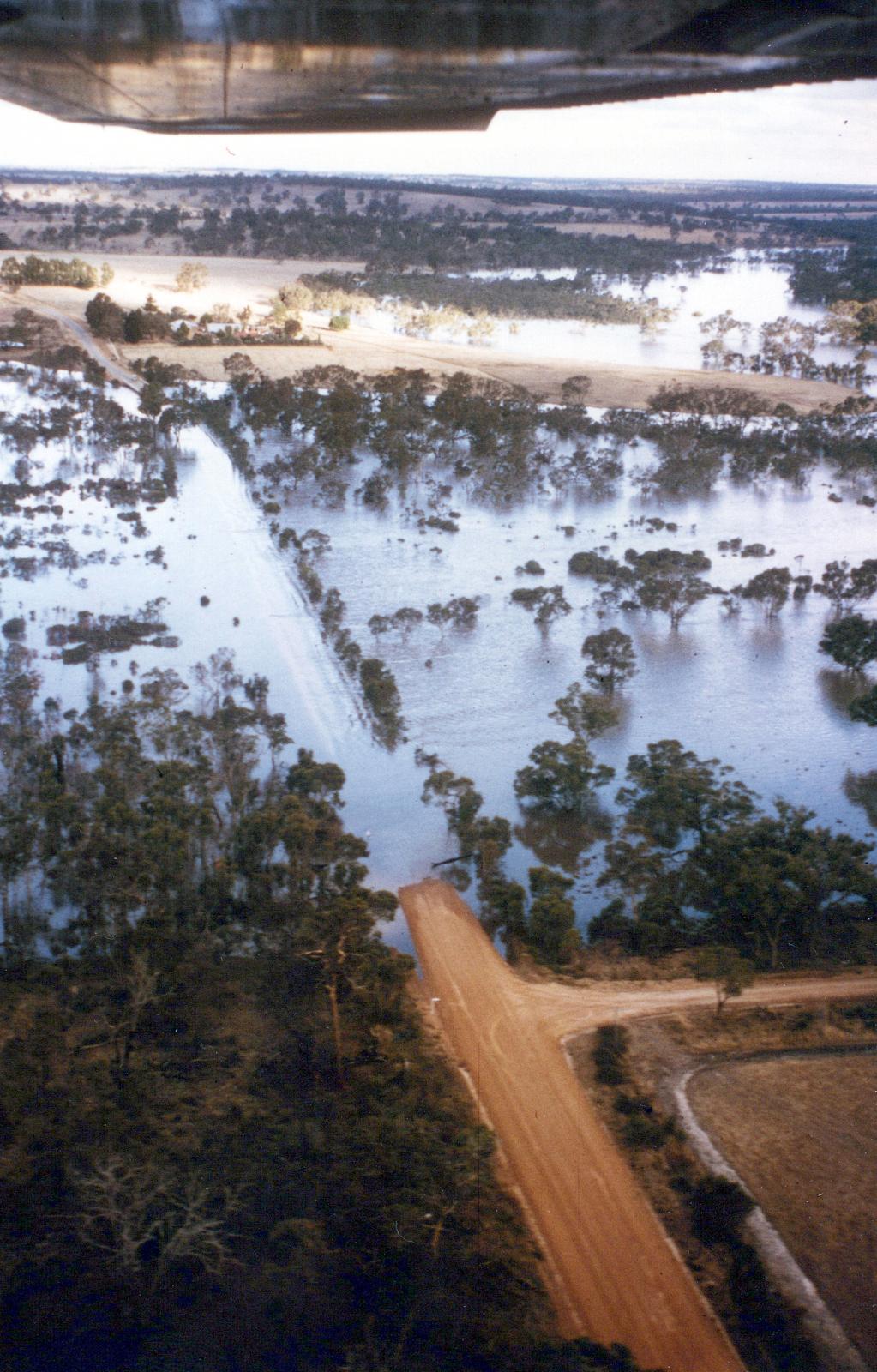 Aerial View Of Peak Flood Water Over The Wingebellup Floodway Early Evening, Sunday,24Th January, 1982.