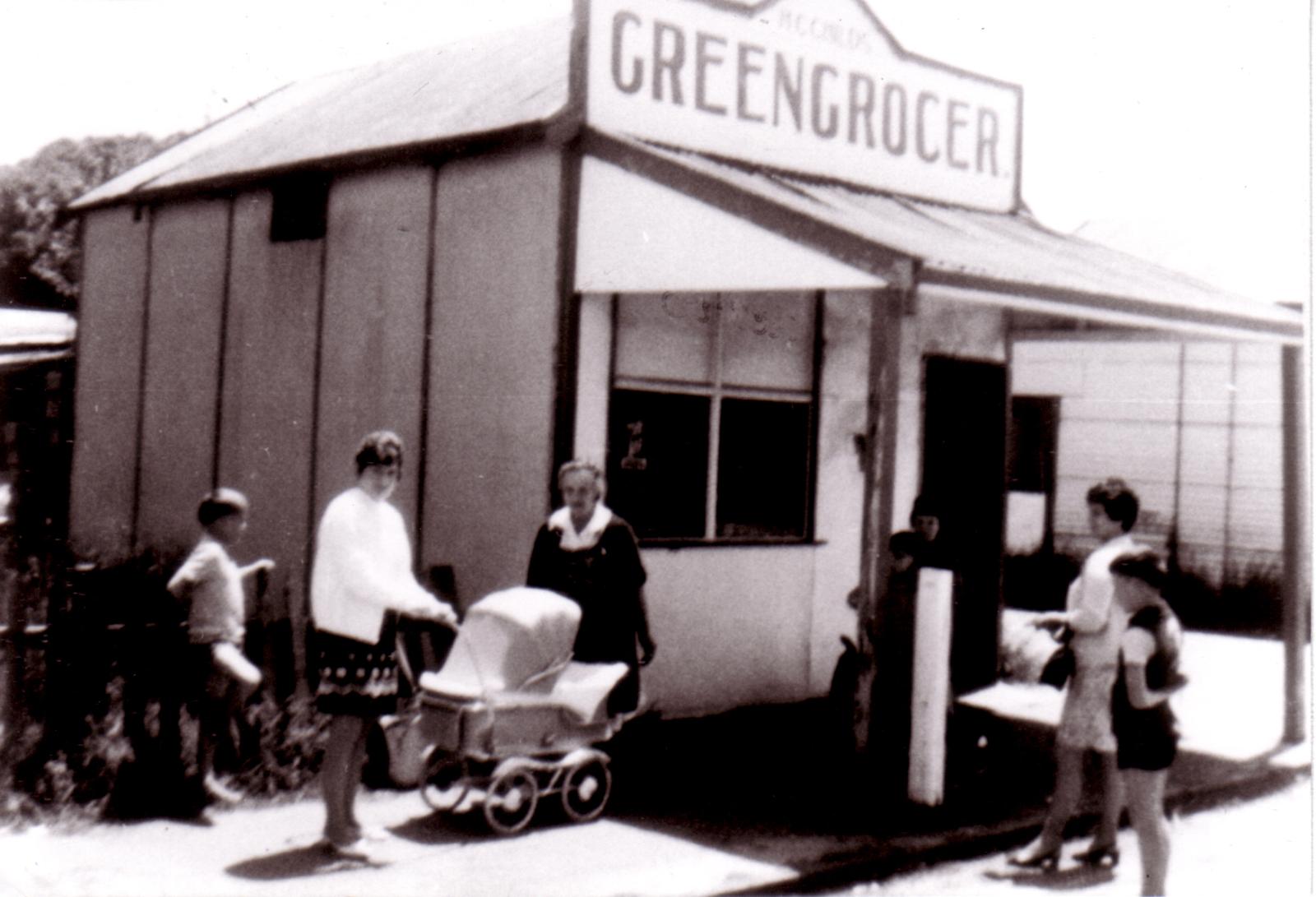 Greengocery Store, with customers in front.