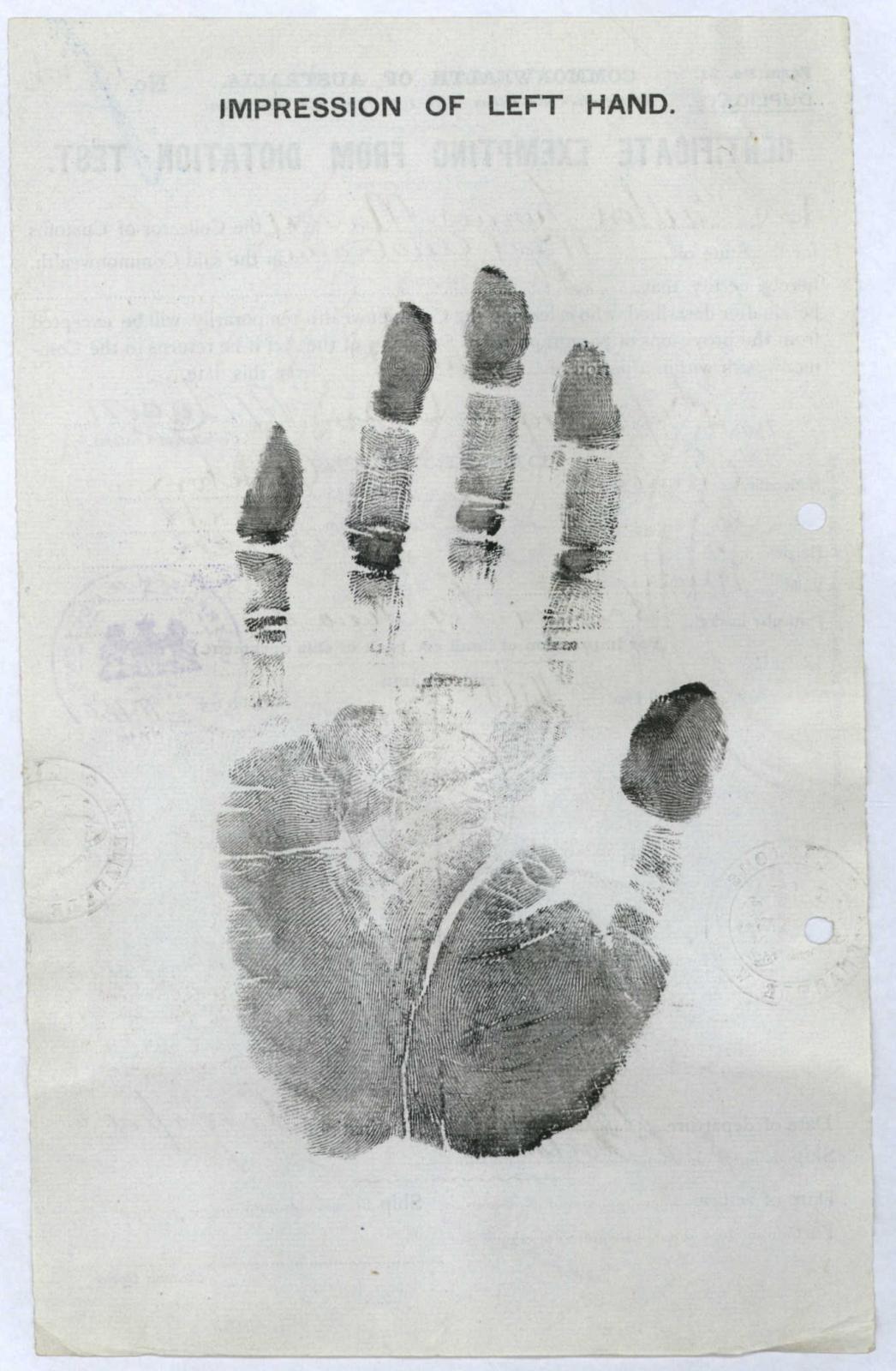 Handprint in black ink