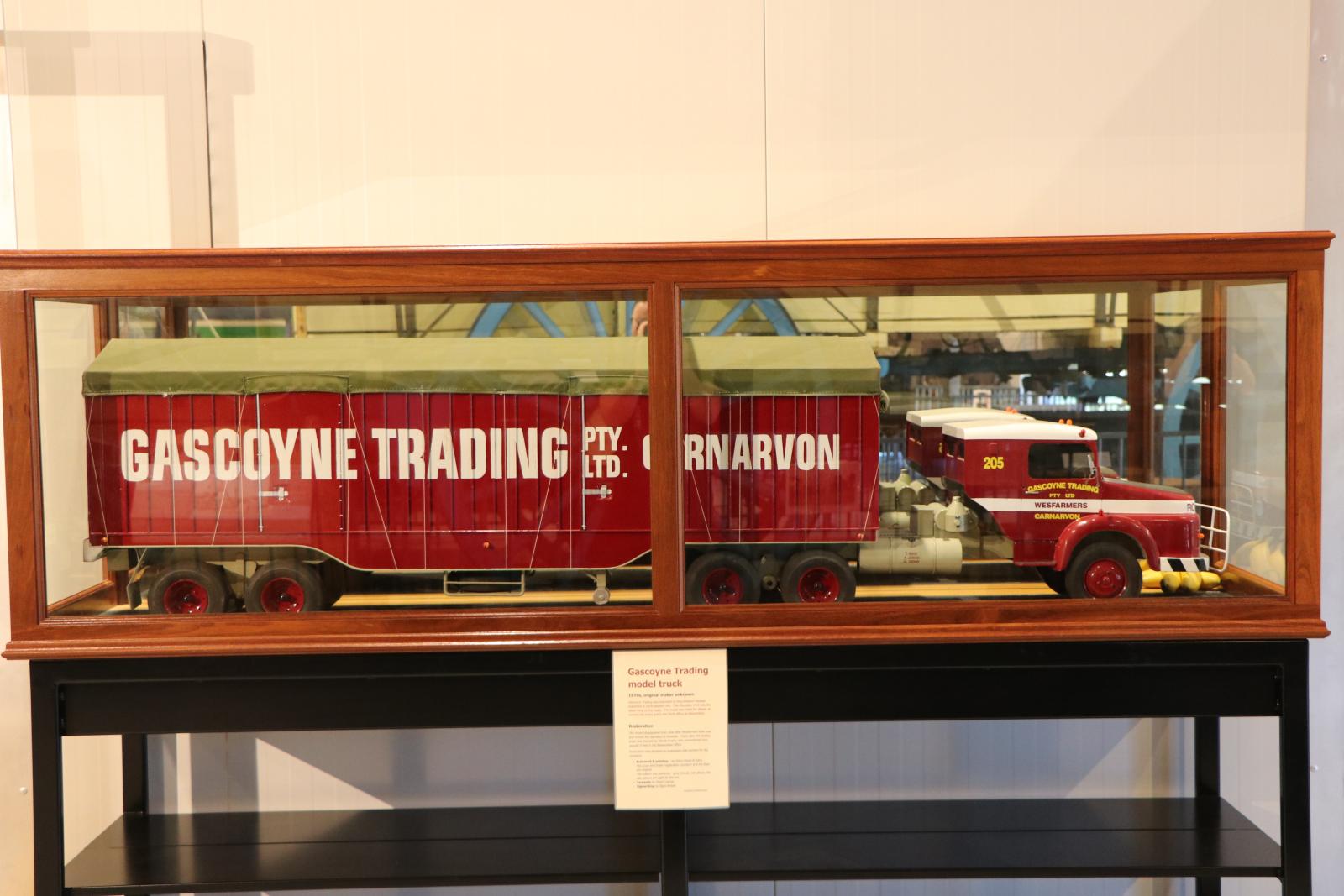 Front on view of Gascoyne model truck in glass and wooden display case.