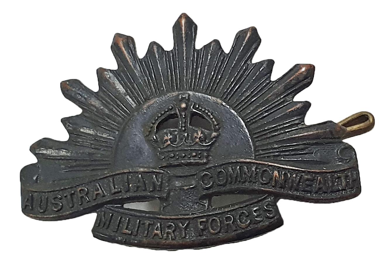 Rising Sun collar badge