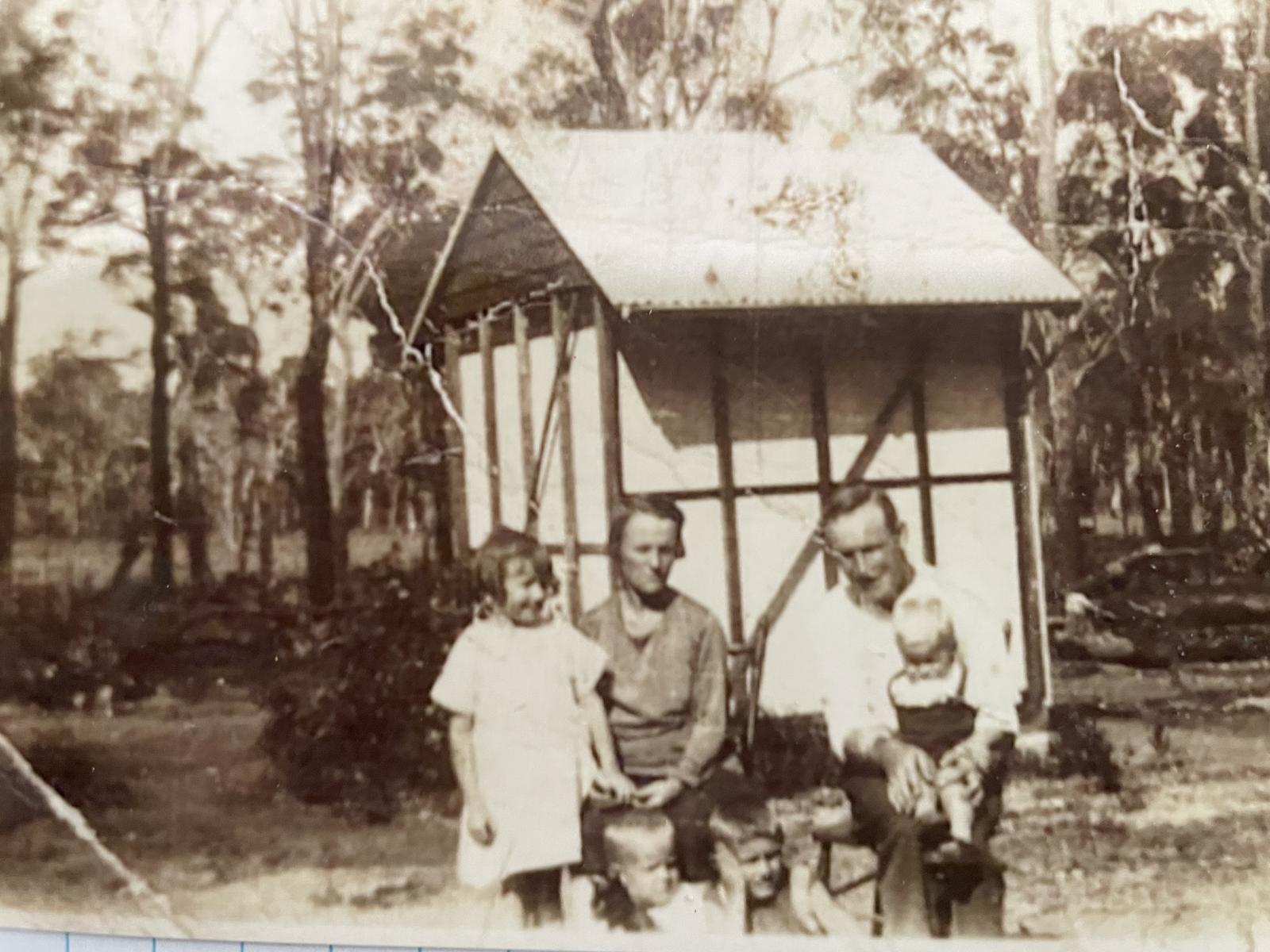 The Reynolds family outside the Cream Room on their farm at Group 132 Catterick Siding1932. 