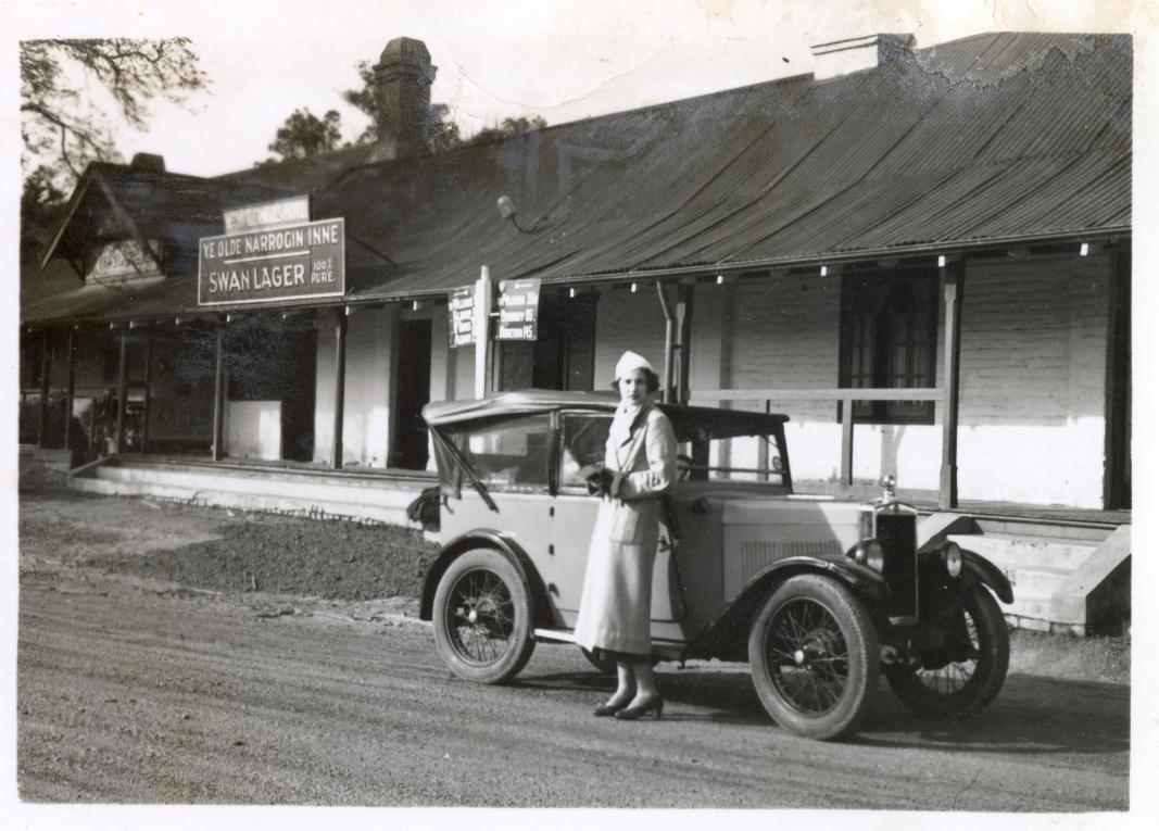 Photograph of Ruby Lambert standing in front of the Narrogin Inne.