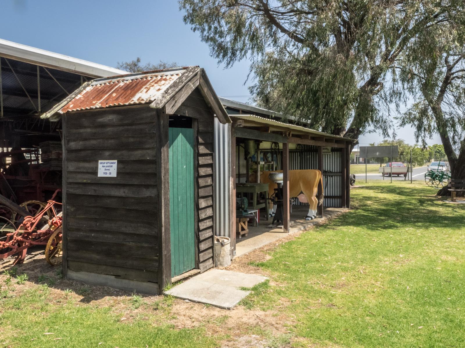 Side view of Group Settlement Pan Lavatory