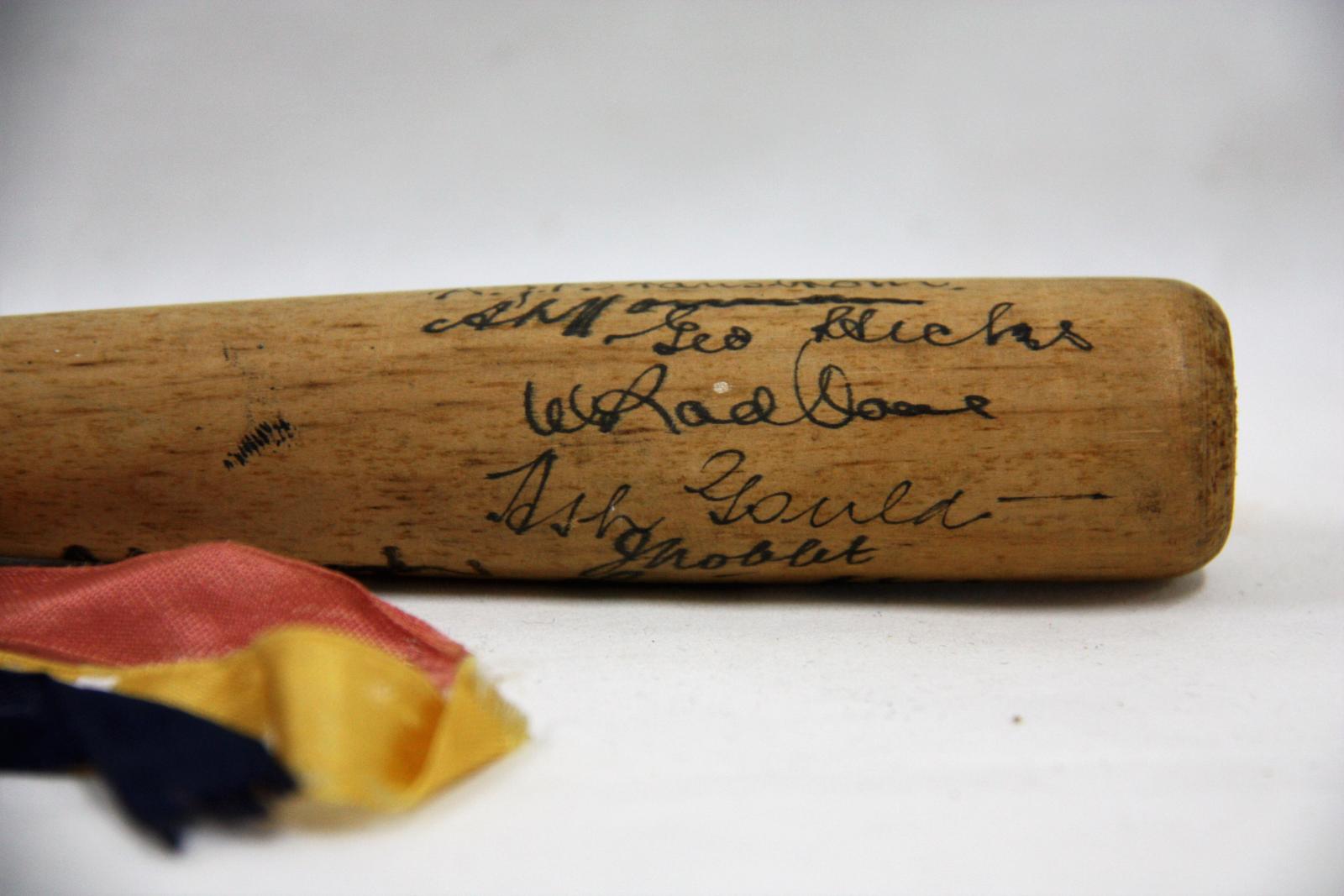 Miniature baseball bat signed by the 1939 South Australian State Team.