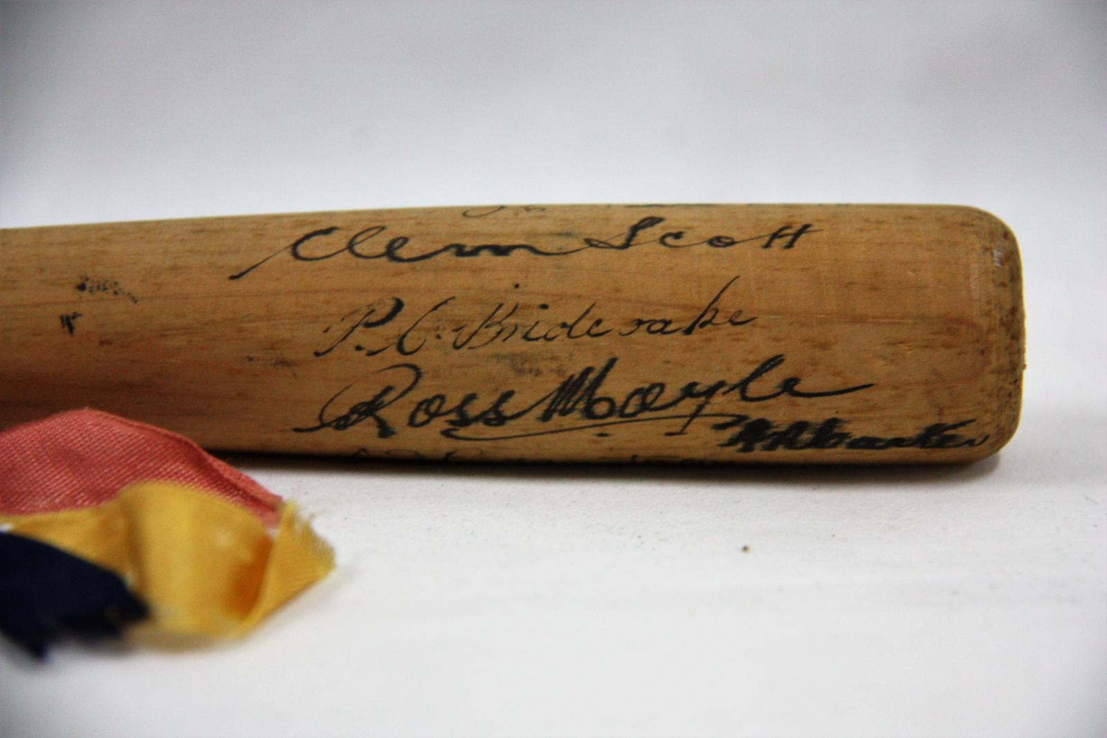 Miniature baseball bat signed by the 1939 South Australian State Team.