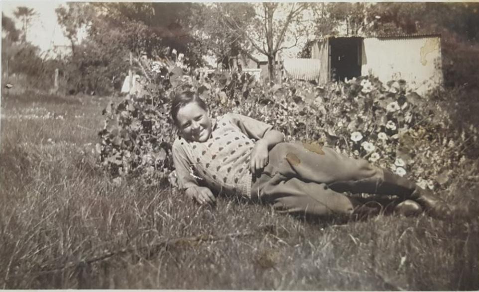 Dennis Walker, 14 years old, 1949, outside the Whiteman Brick Office home which consisted of a few acres where Dennis and his mother Shylie kept a milking cow, chickens and horses.