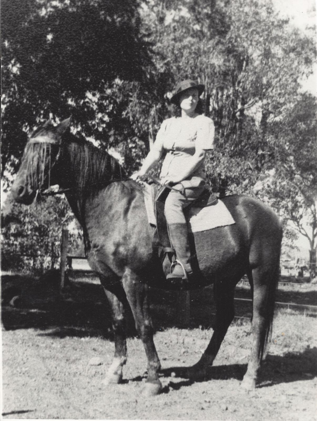Shylie Walker on Dynamite. Shylie worked as a jillaroo at Mussel Pool for Lew Whiteman during the Second World War. This photograph was taken around 1945 and the horse Dynamite was owned by Lew Whiteman.