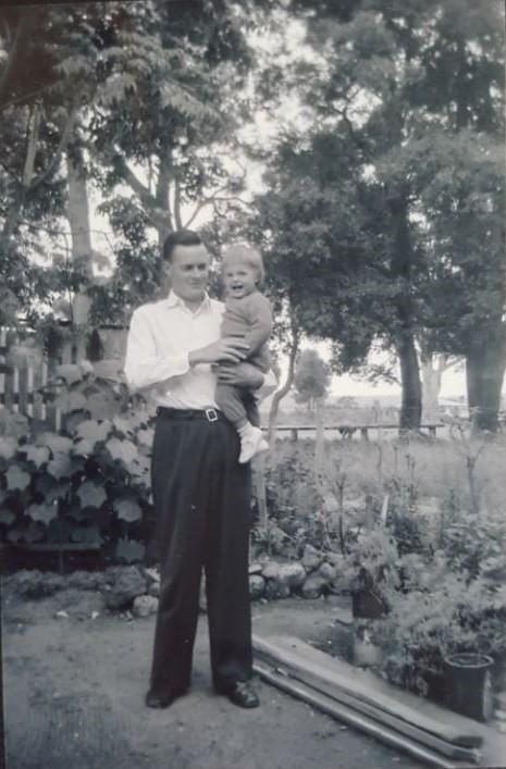 Dennis Walker with his daughter Rita in the vegetable garden at the Whiteman Brick Office home where he grew up.