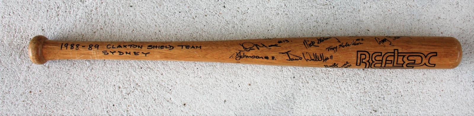 Souvenir baseball bat signed by 1988-89 Claxton Shield Team