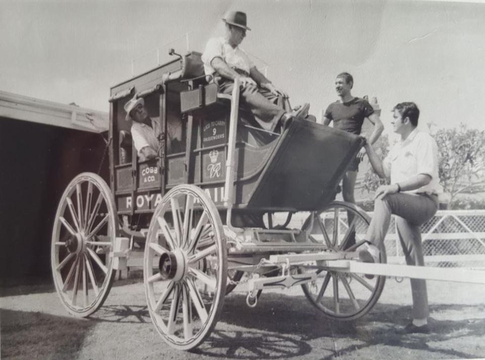 P25-07. Lew Whiteman at The Diary in Guildford with one of his Cobb & Co coaches, early 1970s.