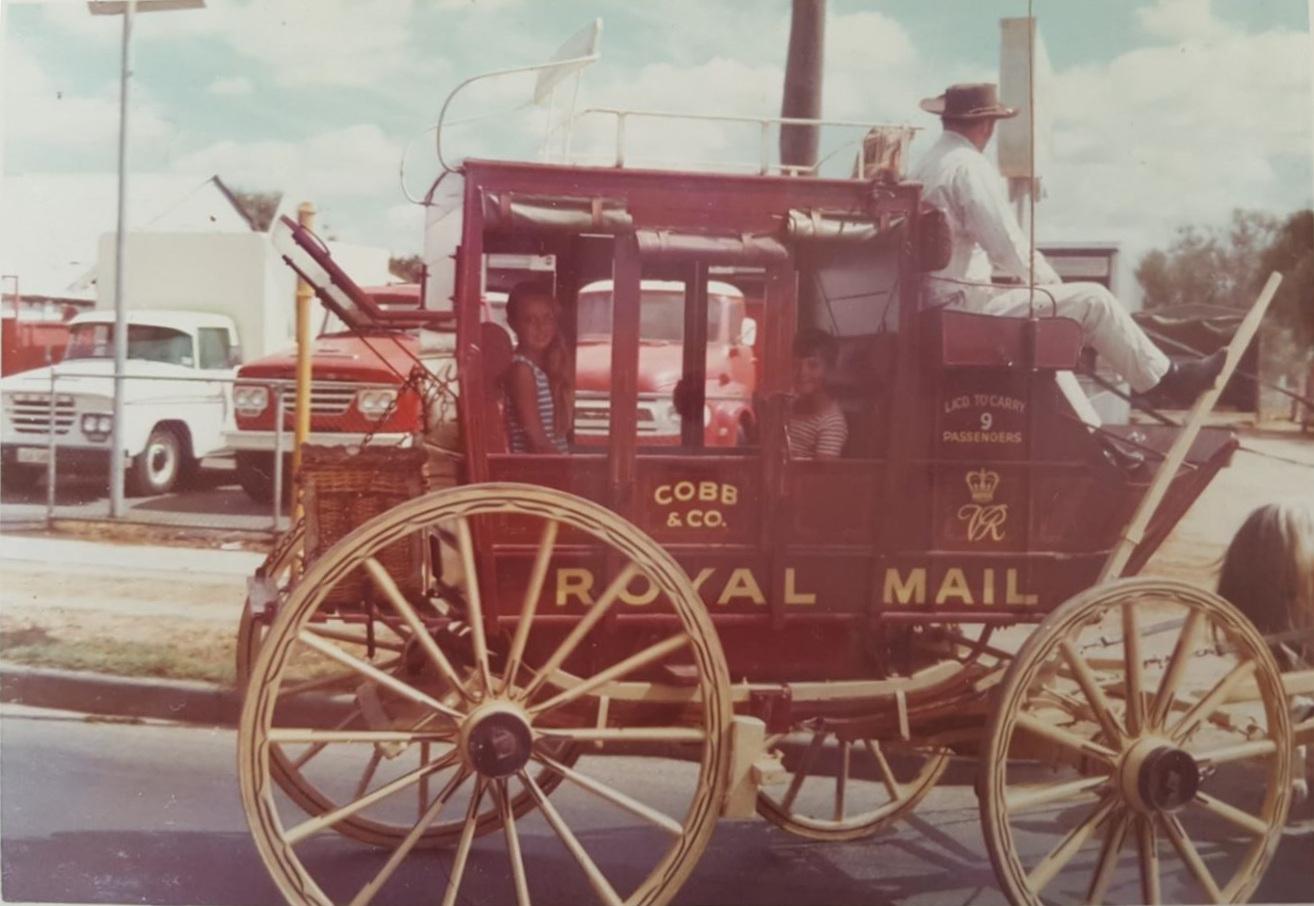 P25-11. Lew Whiteman's Royal Mail Cobb & Co coach, which featured at the Midland Oval Show, returning to The Dairy at Guildford. Lew's grandchildren Rita and Peter are seated inside the coach. 