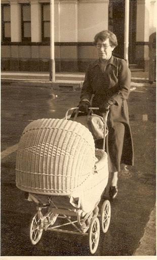 Gladys Morrell pushing a pram