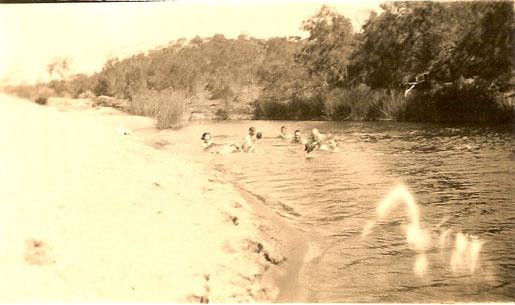 Photograph of people swimming in the Greenough River