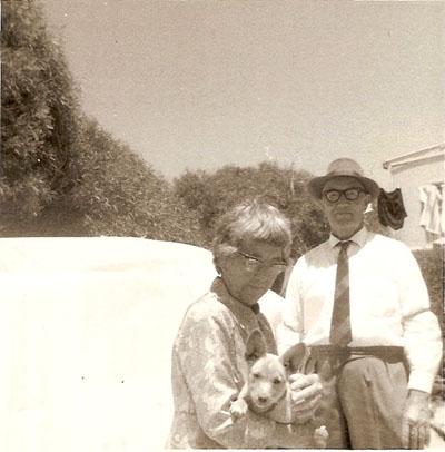 Photograph of a couple with a dog