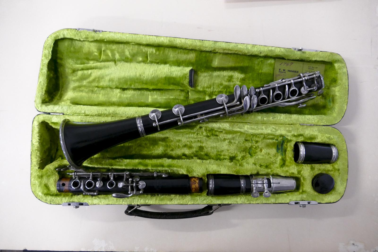 The Bb Clarinet is a German made Artley. It is a full Boehm system wooden clarinet which was owned by John from the 1950's. 