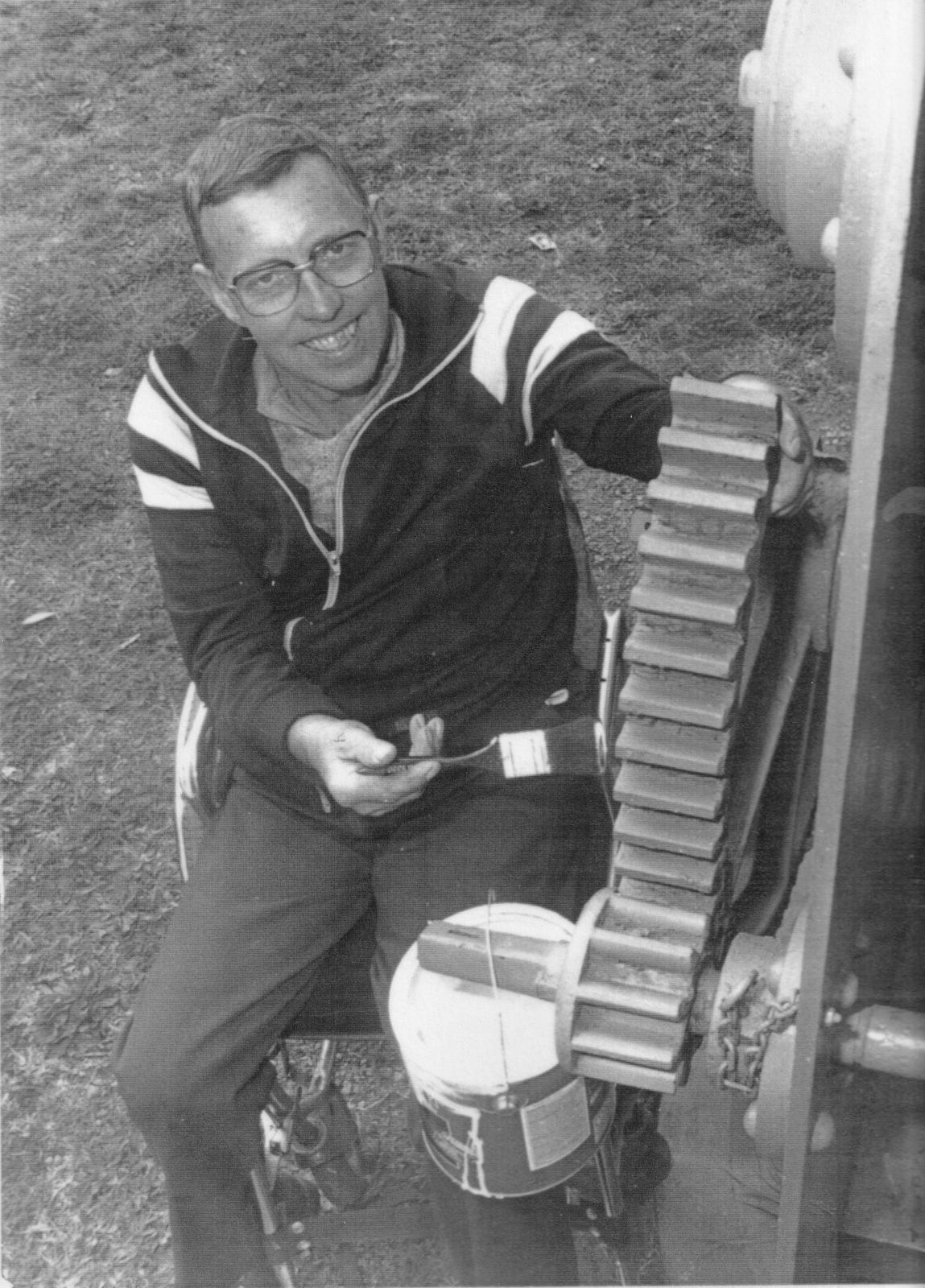 A young John Cannam hard at work restoring a piece of machinery