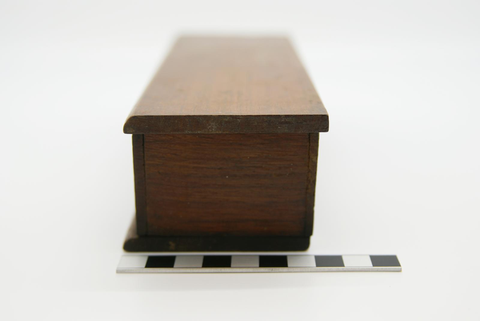 oblong wooden box, end