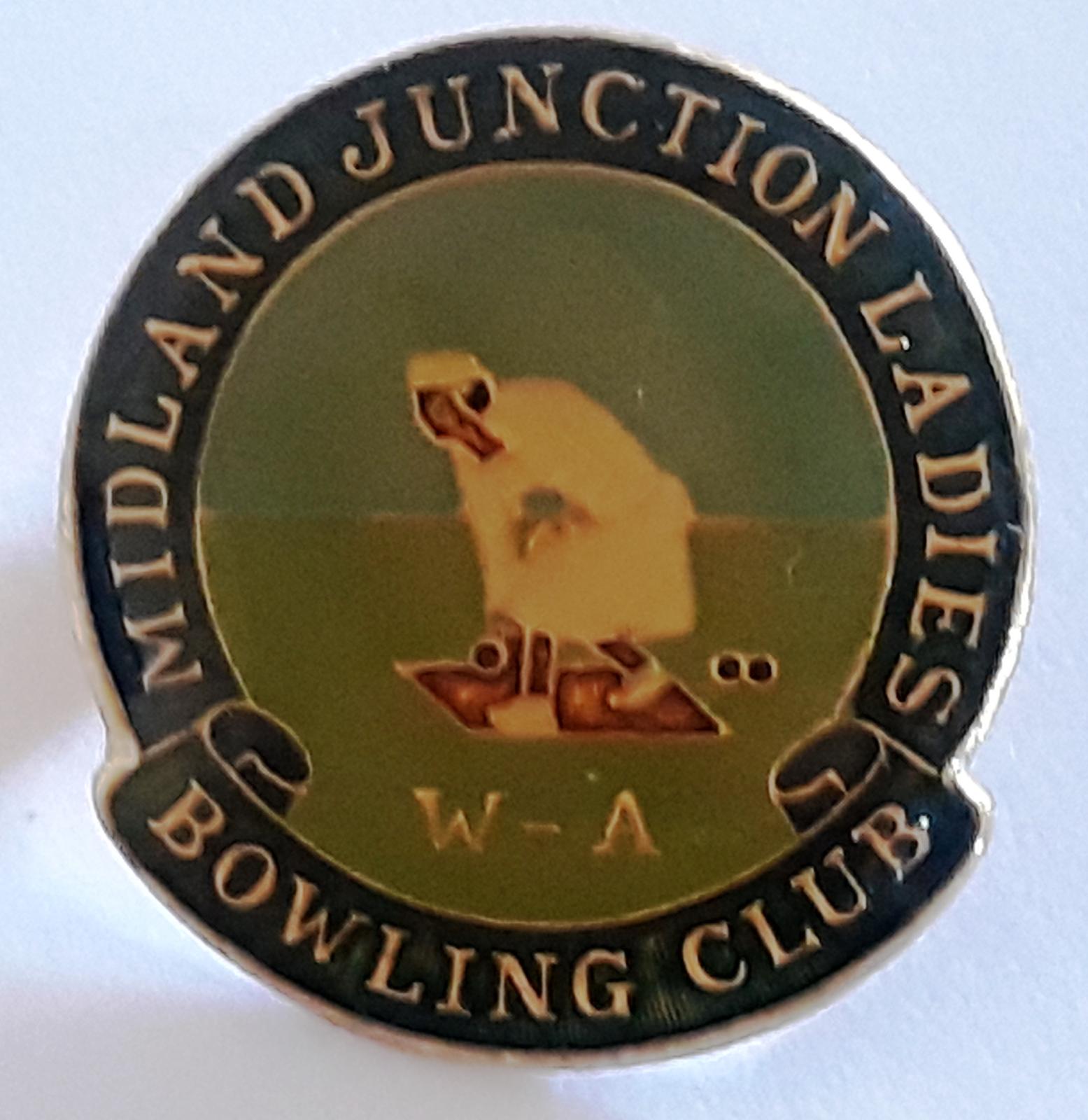 Midland Junction Ladies Bowling Club Inc. Round-shaped badge in green, cream, gold and black.