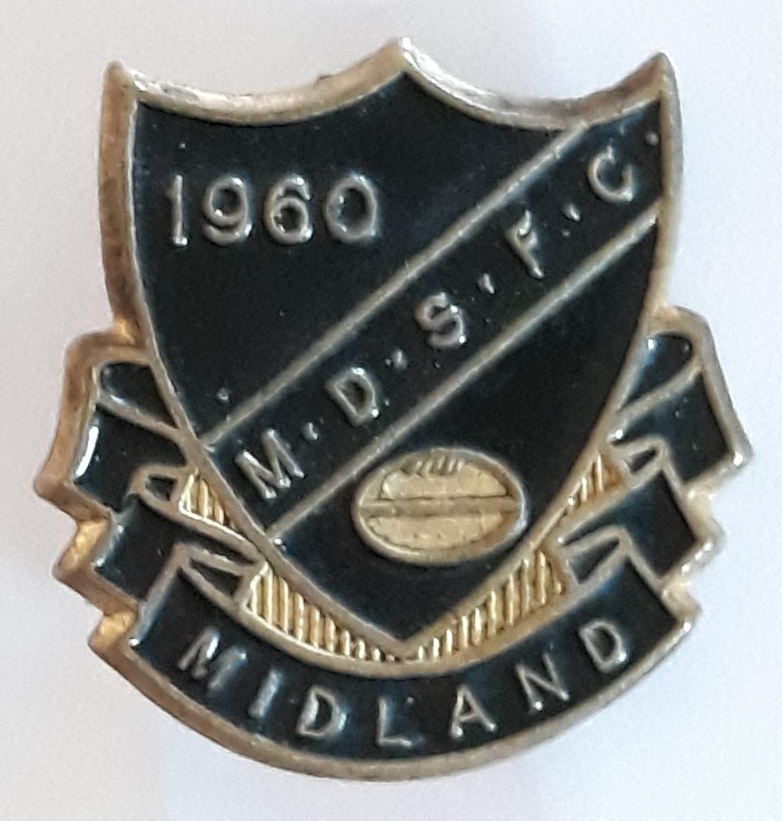 Midland District Sunday League Football Club 1960. Shield-shaped badge in black and gold. 