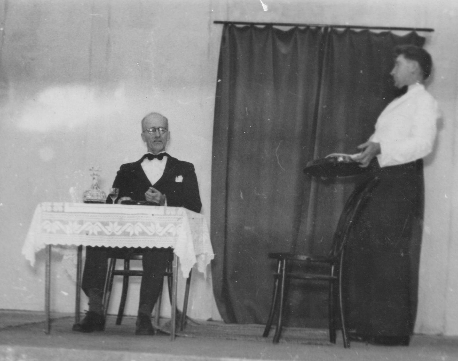 Reverend Canon Davies (seated) in a Busselton Repertory Club performance at the Weld Theatre c1960. Photo 1017 BHS Archive