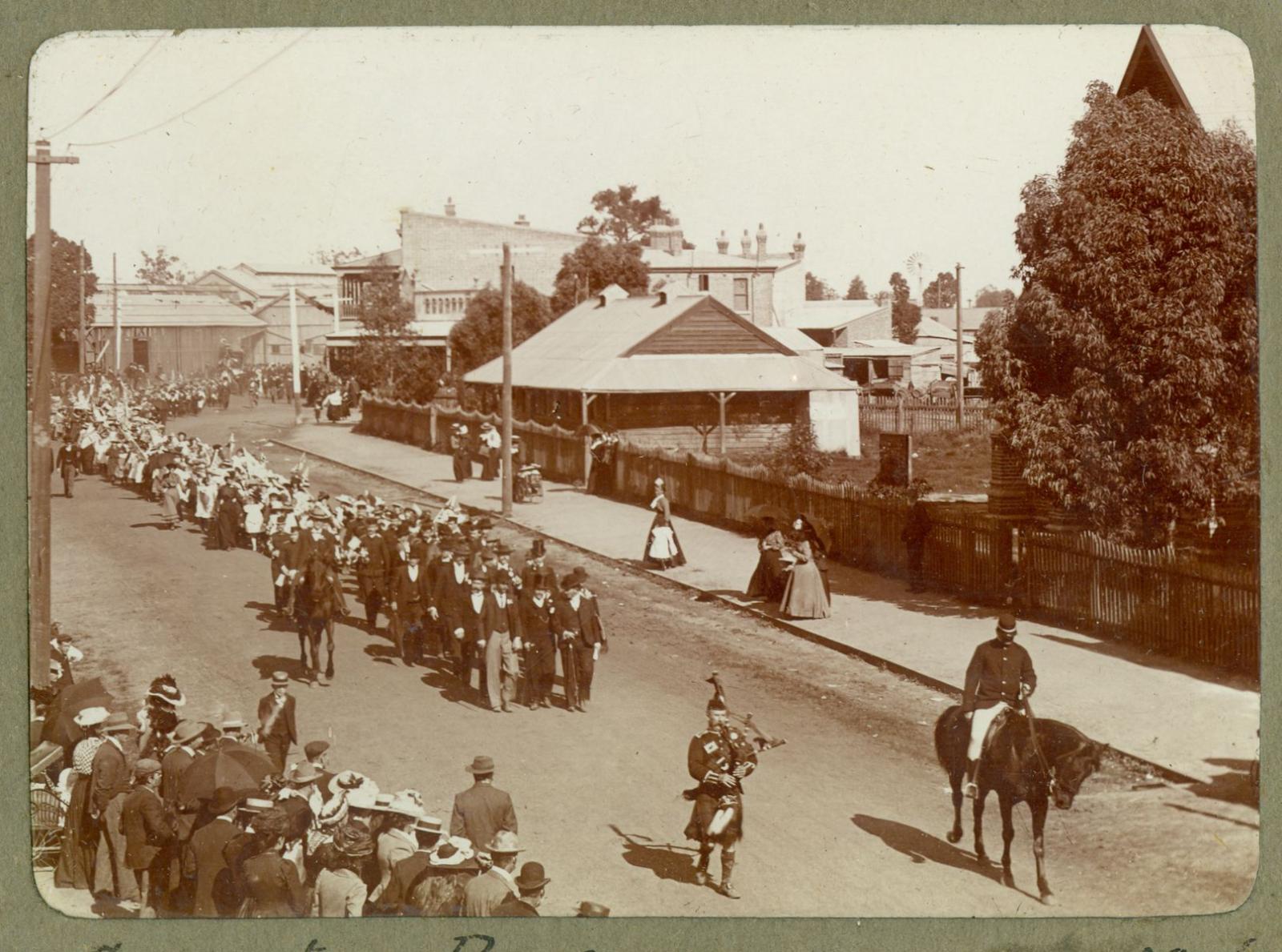 P100-02. Coronation procession moving east along Newcastle Road (Great Northern Highway).