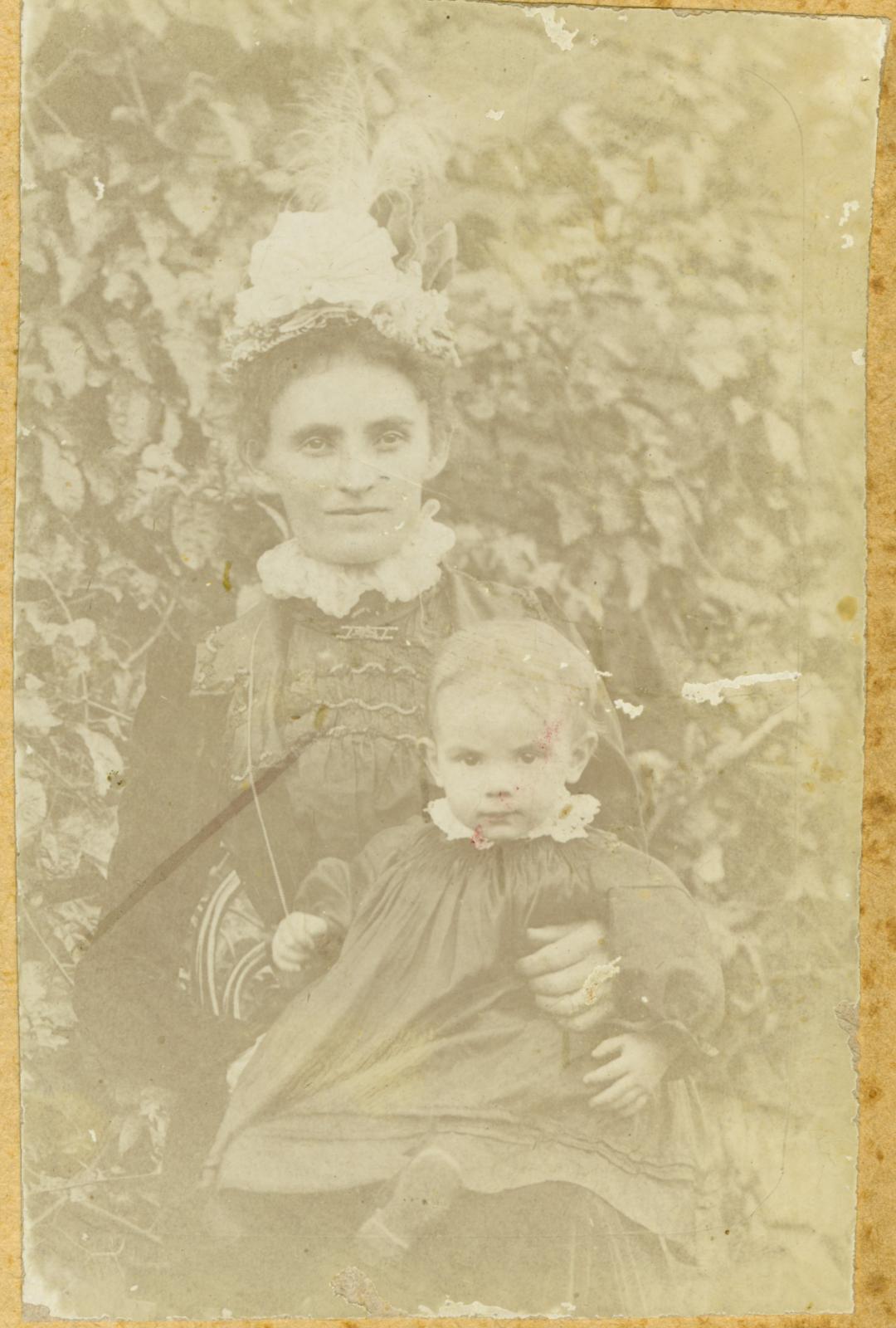 P100-26. Unknown woman and child.