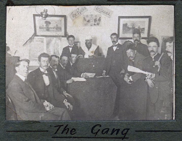 P100-37. Group of unknown men. Caption reads 'The Gang'.