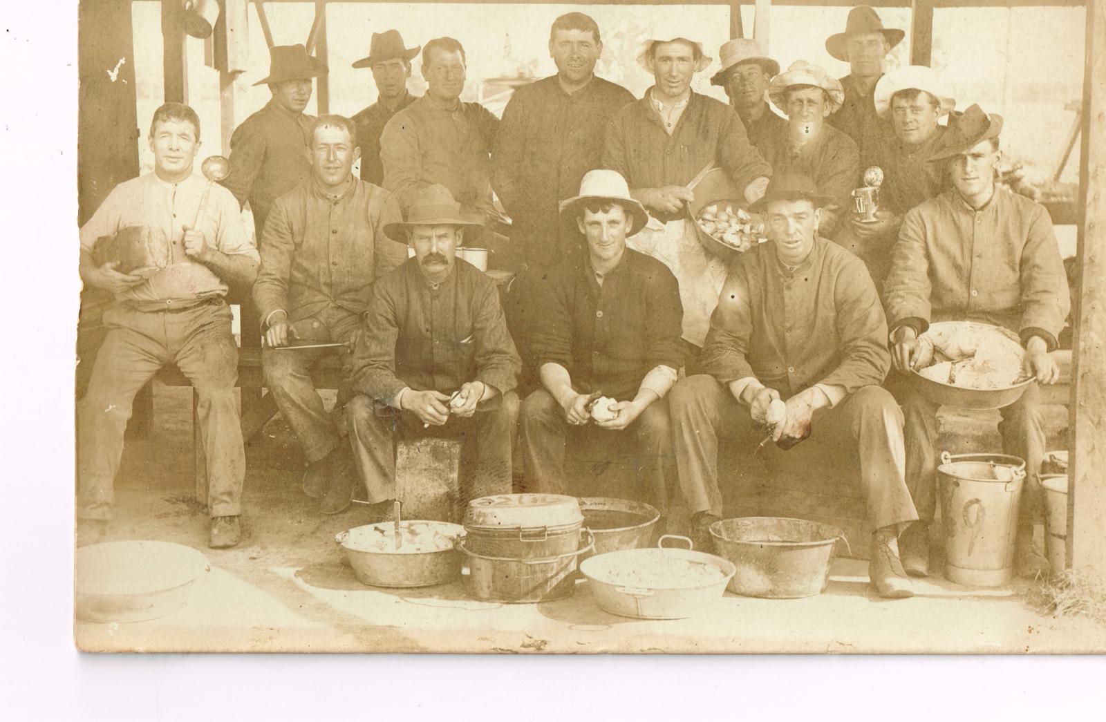 P103-01. Walter Day, centre front wearing dark shirt and light hat. The man to Walter's left is likely to be Harry Elms. Image is believed to have been taken at Blackboy Hill camp.