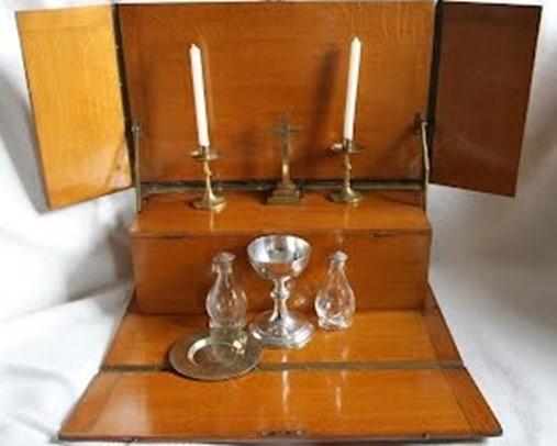 Communion set on portable wooden altar