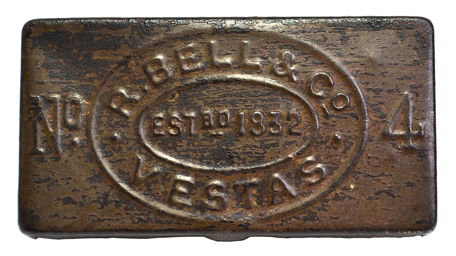 Top view of metal matchbox holder showing text on the lid. Text reads "R. Bell & Co VESTAS No 4"