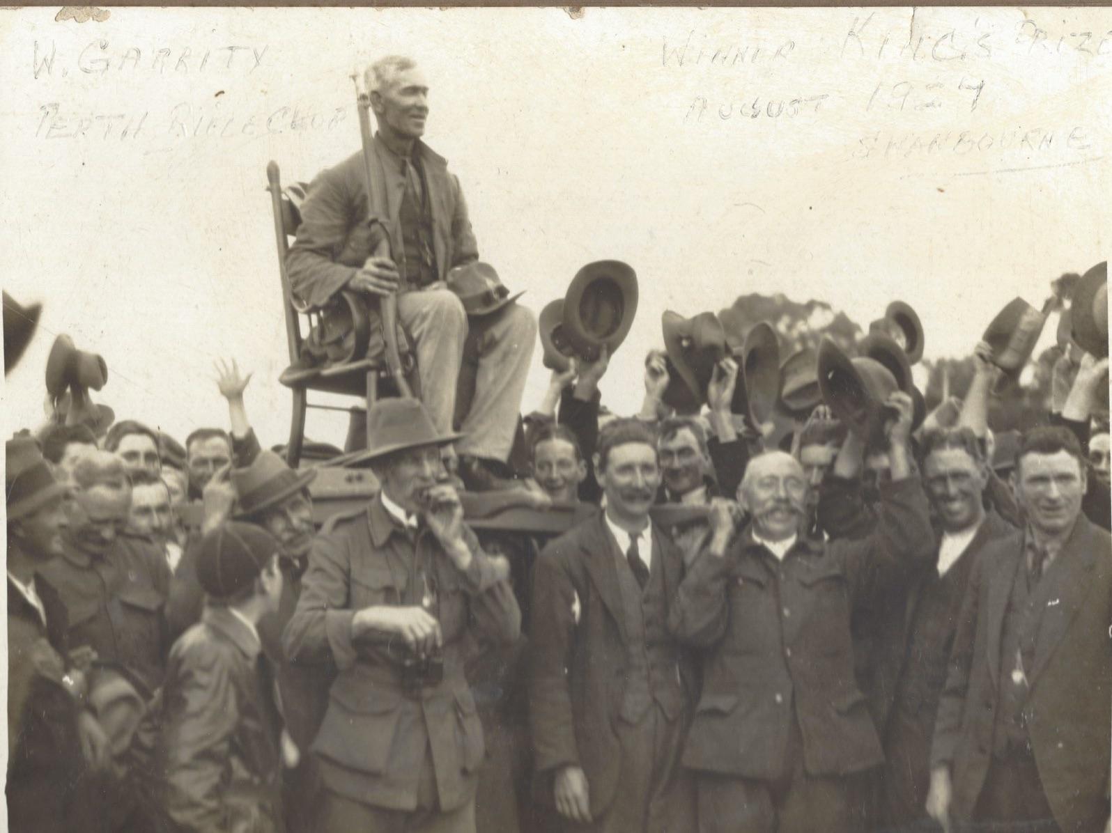 Bill Garrity being chaired from the mound