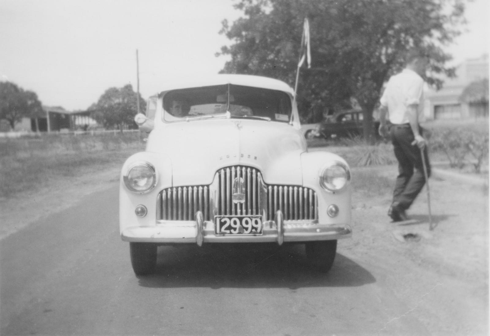 Ken Bass exiting John O'Neill's FX Holden outside the MRWA administration office.