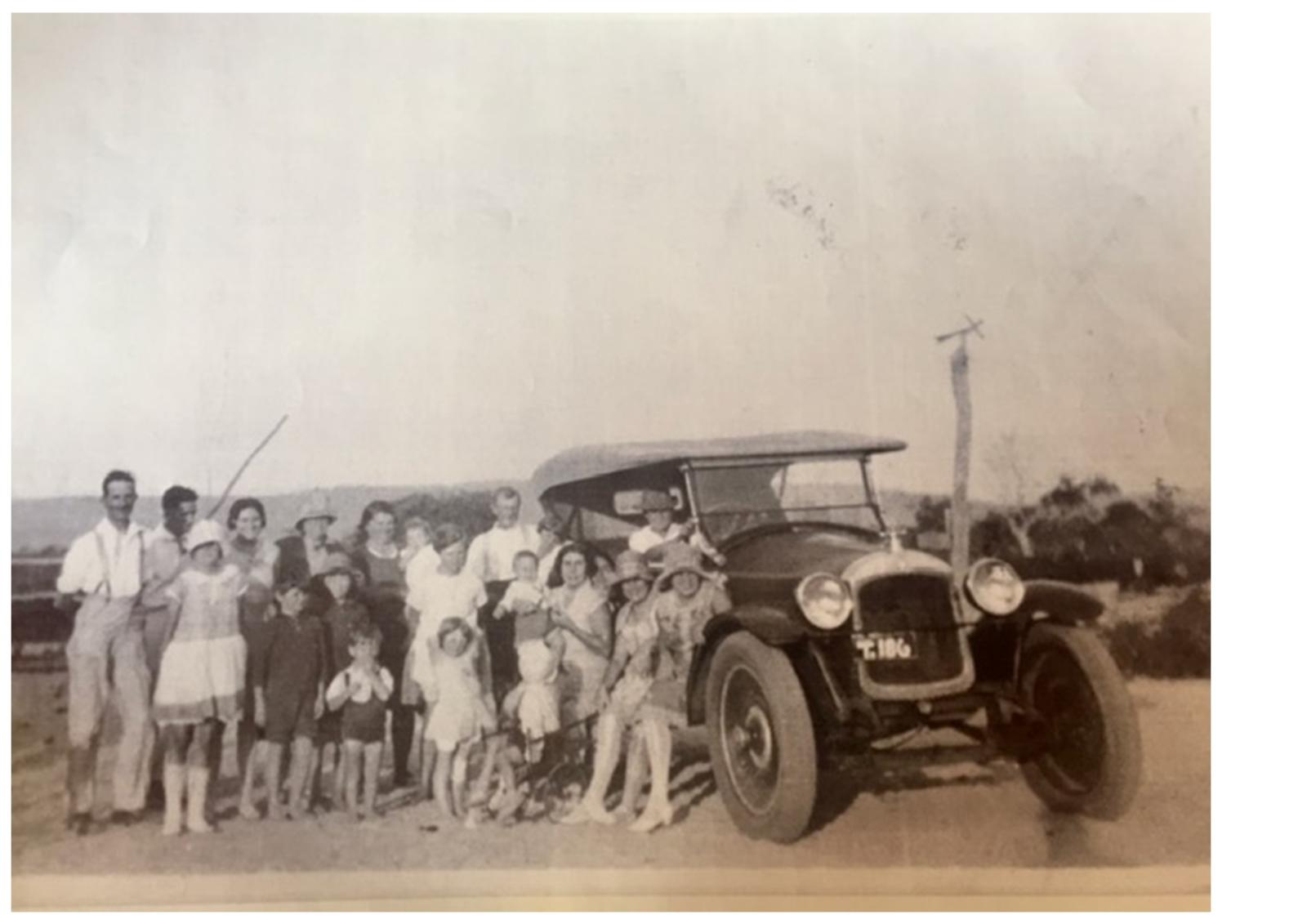 A Shepherd family gathering with visitors from the city.