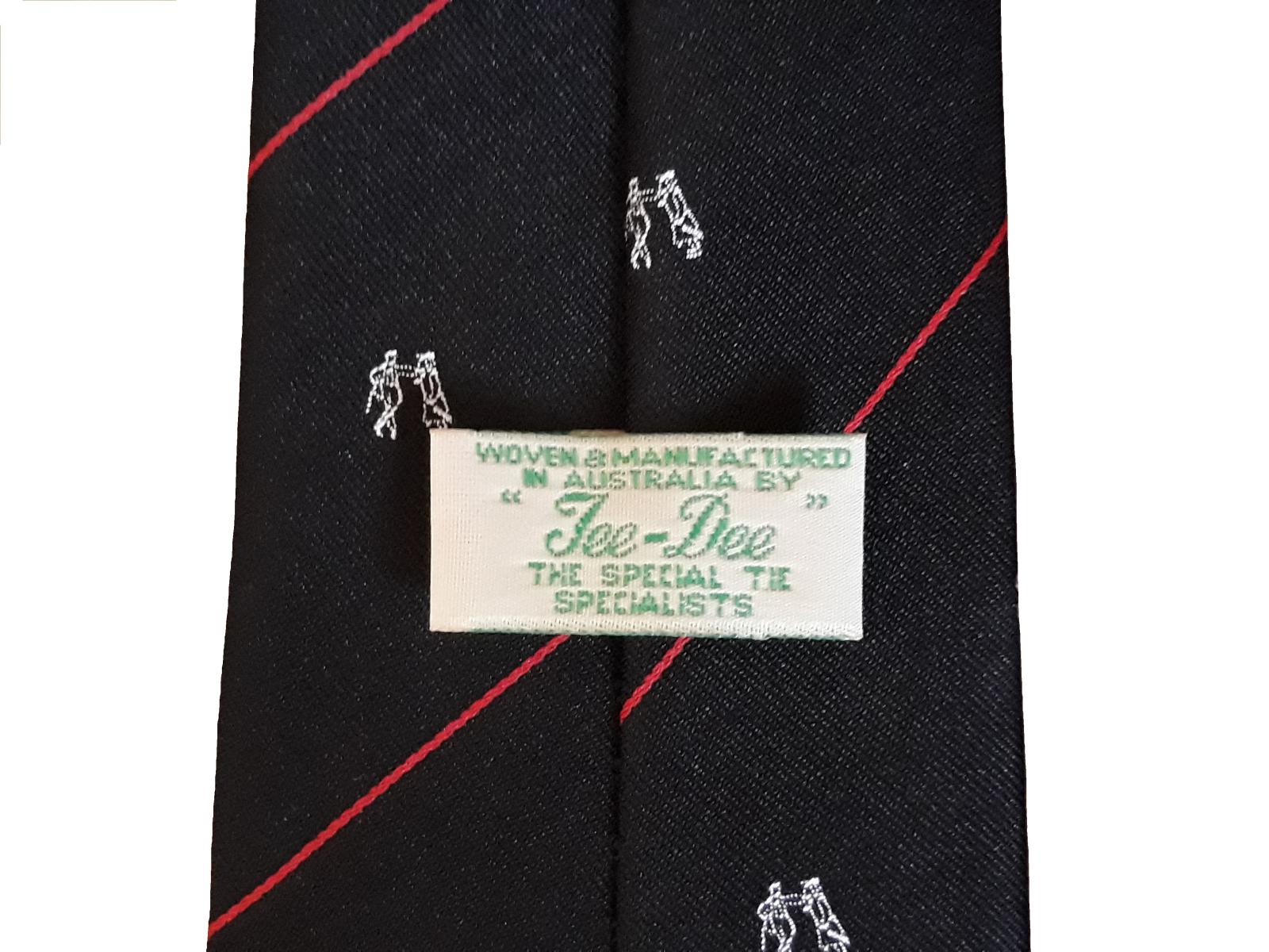 Hutton's small goods company promotional neck tie, detail.