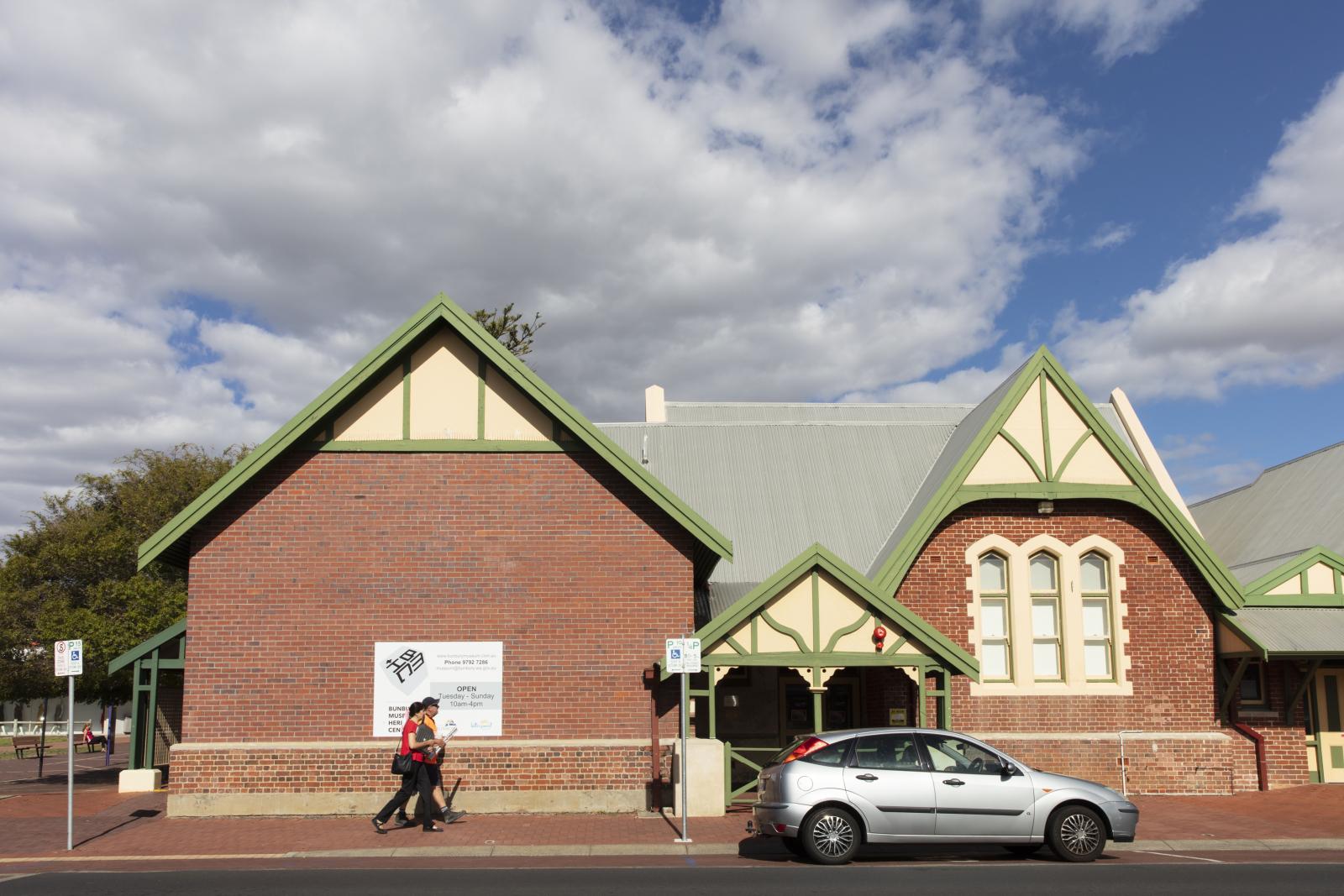 People walking past the Bunbury Museum and Heritage Centre