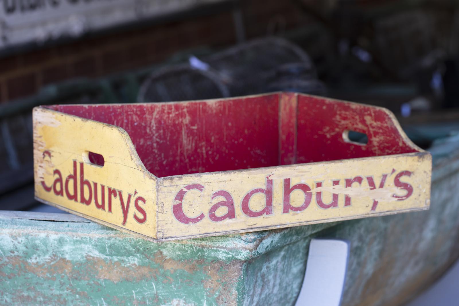 Red and yellow Cadbury's chocoloate tray (view from front left)