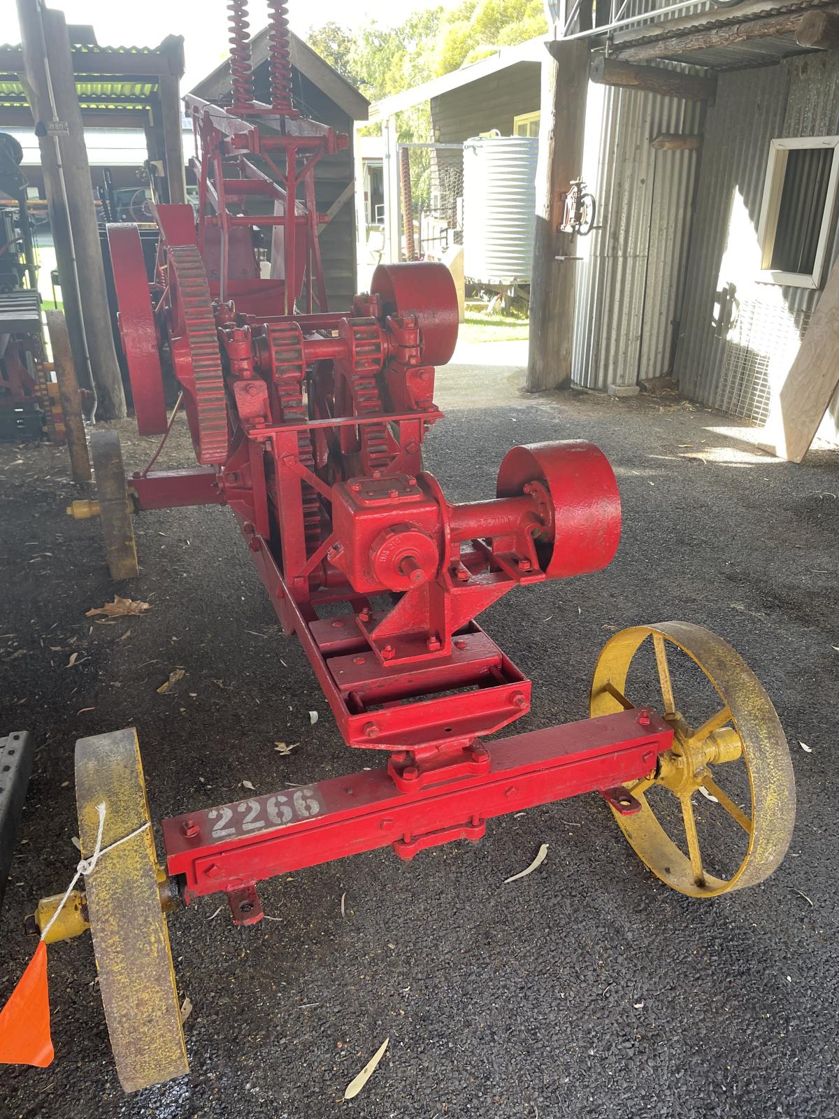 Front view of the Imperial Bagshaw Stationary Hay Baler