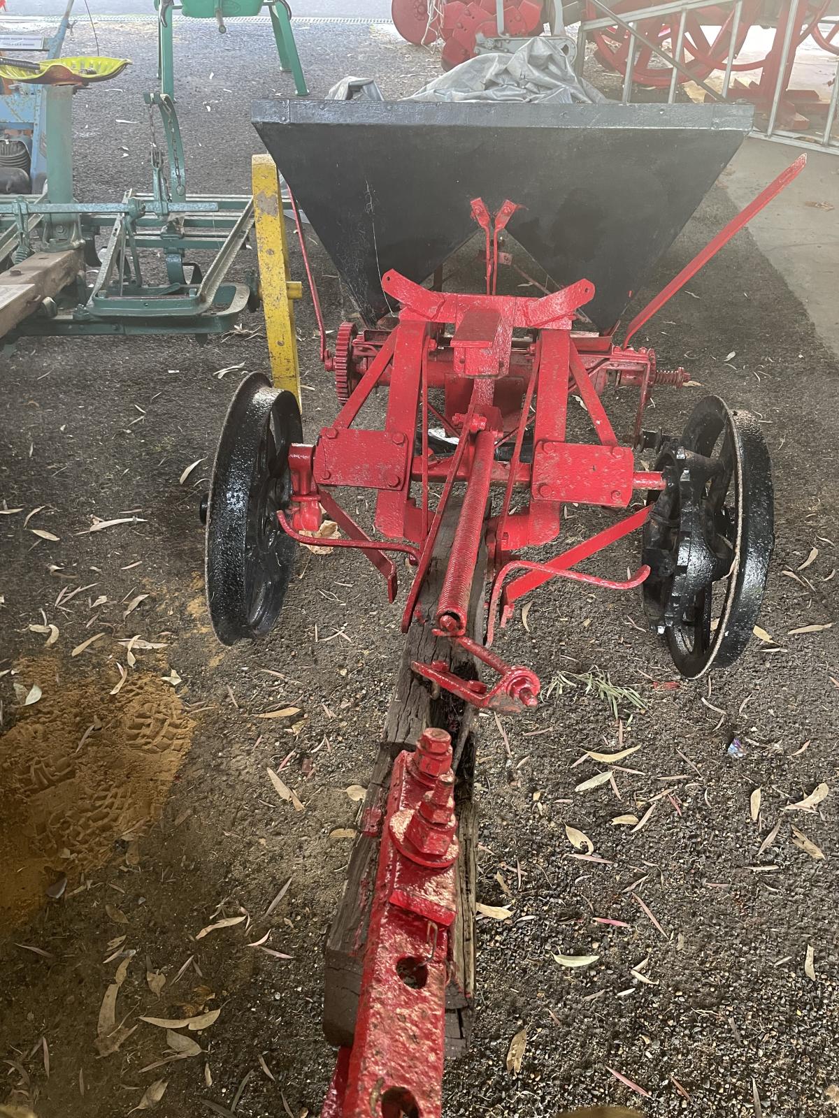 Seed Spreader front view showing towbar converted for tractor towing