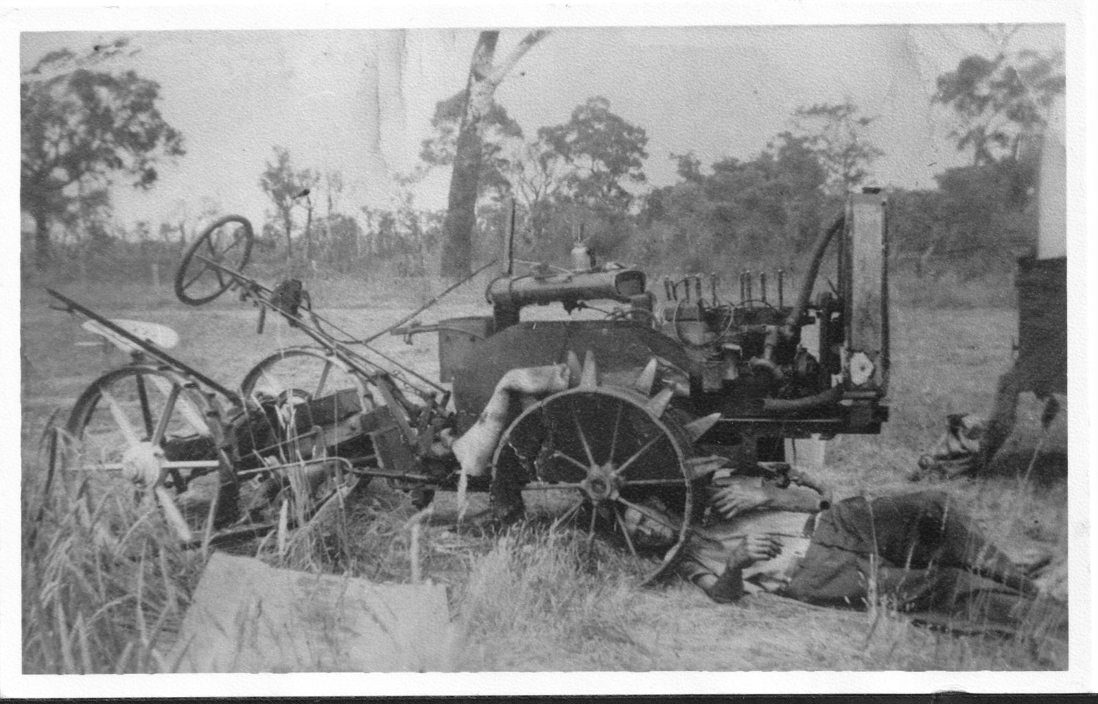 Carter Harbeck working on this Centaur tractor at the farm in Acton Park c1945. Photo 0117 from BHS Archive