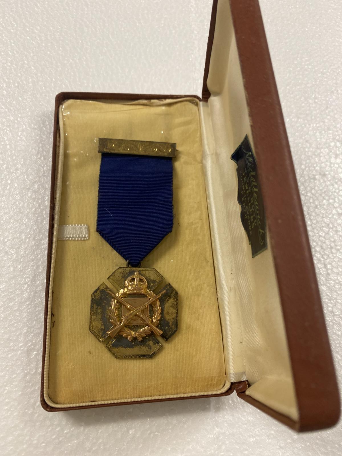 medal in presentation case