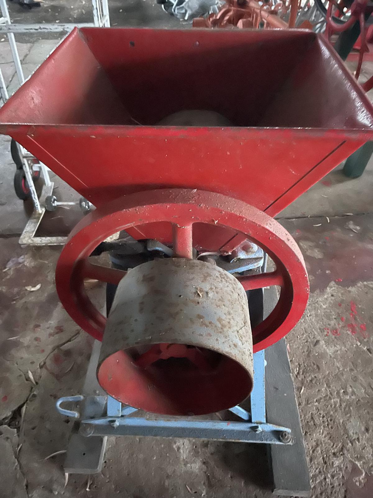 International Harvester grain grister showing pulley wheel