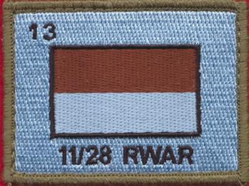 11/28 Shoulder badge