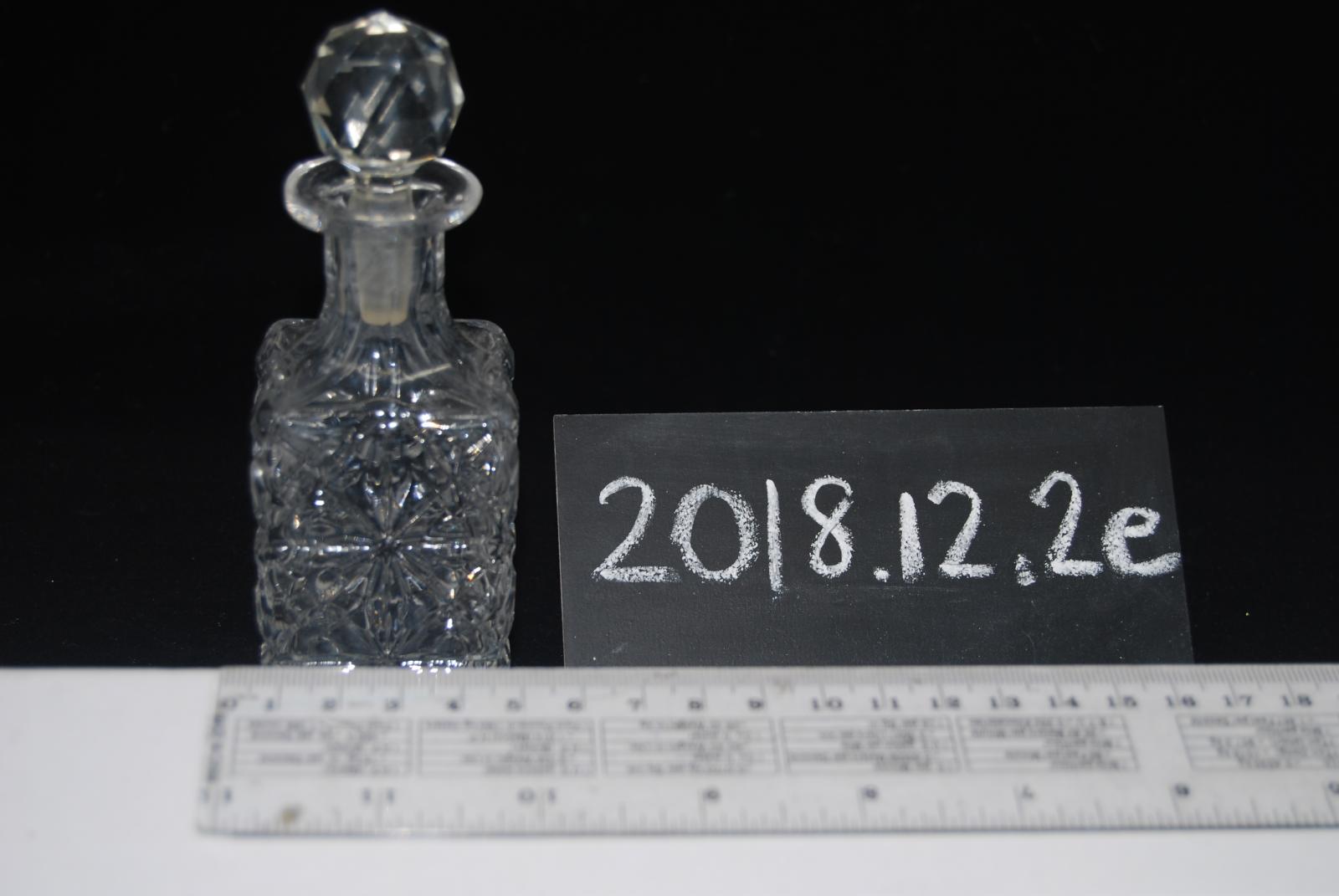 One of the glass bottles with a glass stopper