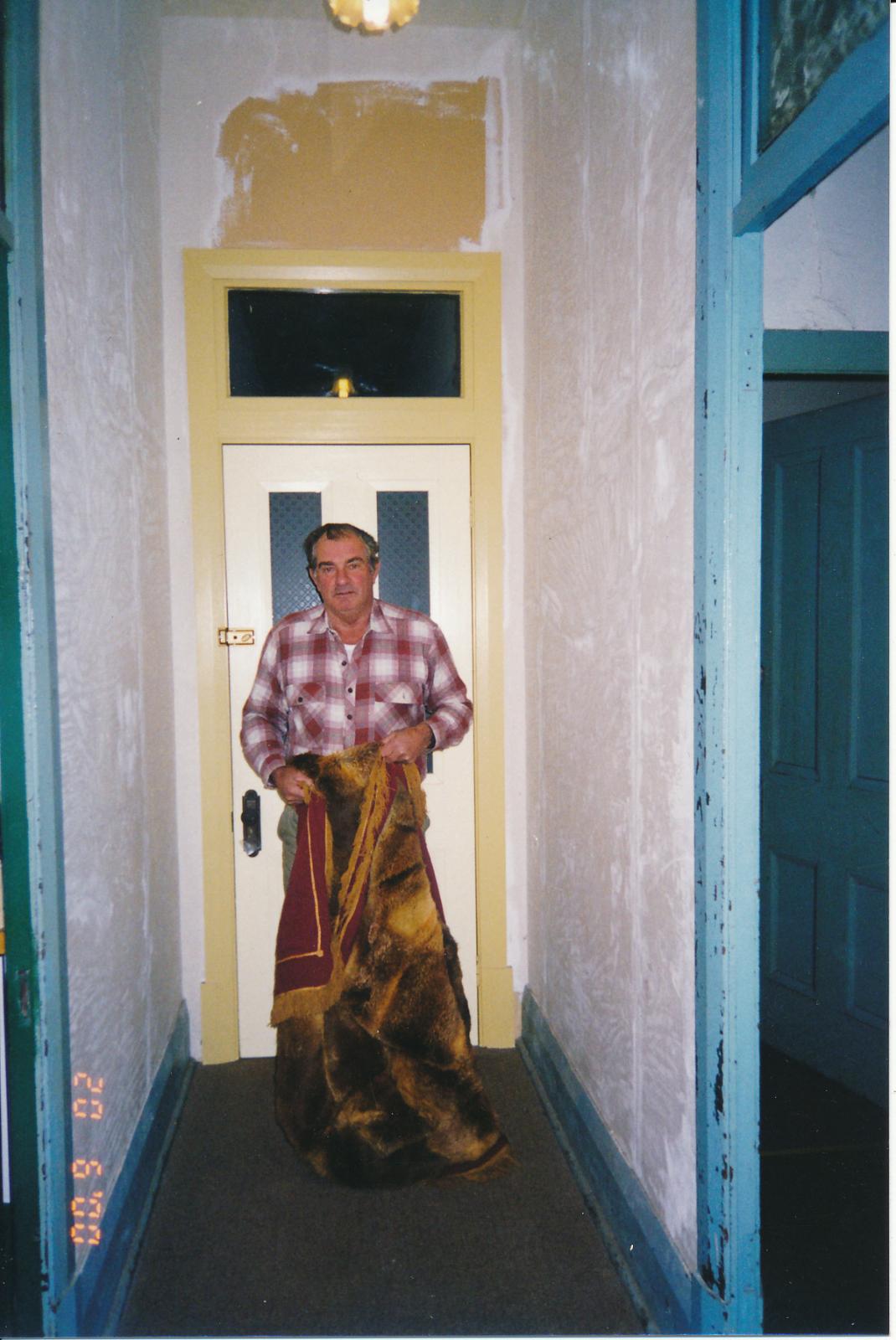 Man holding Fox Skin Rug