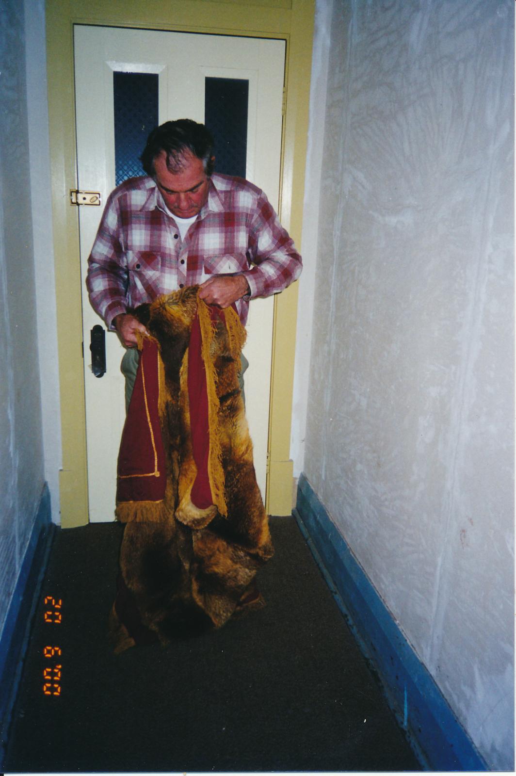 Man holding Fox Skin Rug